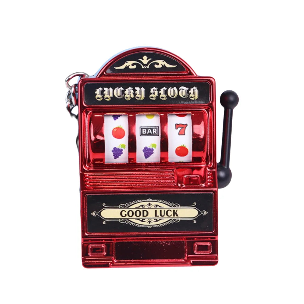 Cartoon Stress Reliever Keychains Coin Operated Games Mini Key Holder Toy Gambling Machine Kids Adult quixgadget