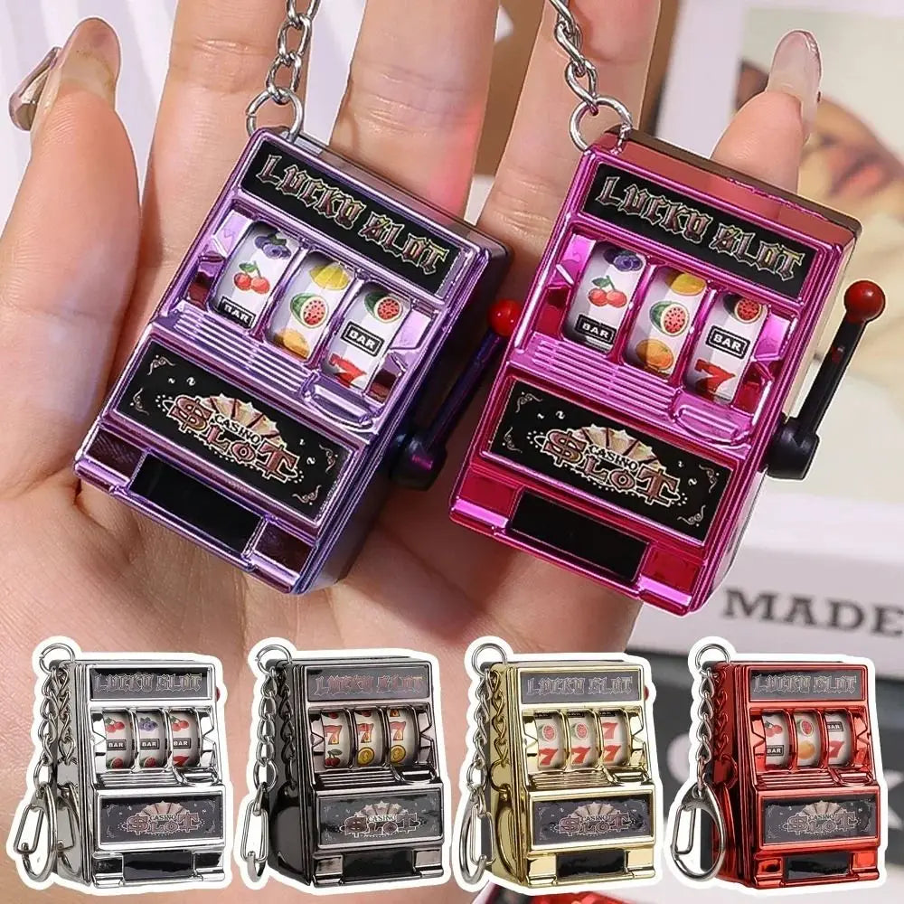 Cartoon Stress Reliever Keychains Coin Operated Games Mini Key Holder Toy Gambling Machine Kids Adult quixgadget