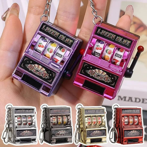 Cartoon Stress Reliever Keychains Coin Operated Games Mini Key Holder Toy Gambling Machine Kids Adult quixgadget